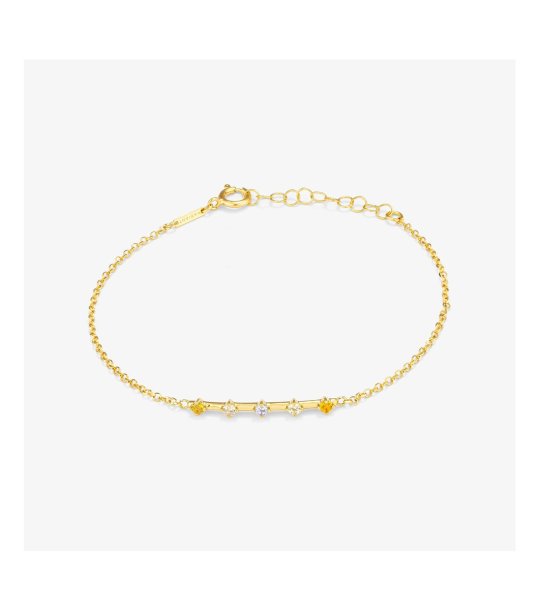 Златиста дамска гривна с камъчета снимка