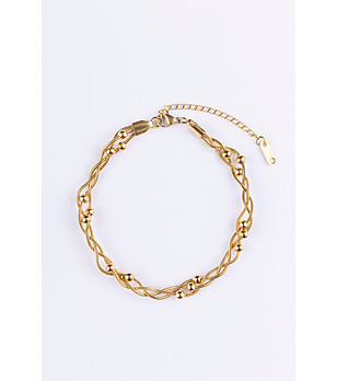 Позлатена дамска гривна с ефектен дизайн снимка